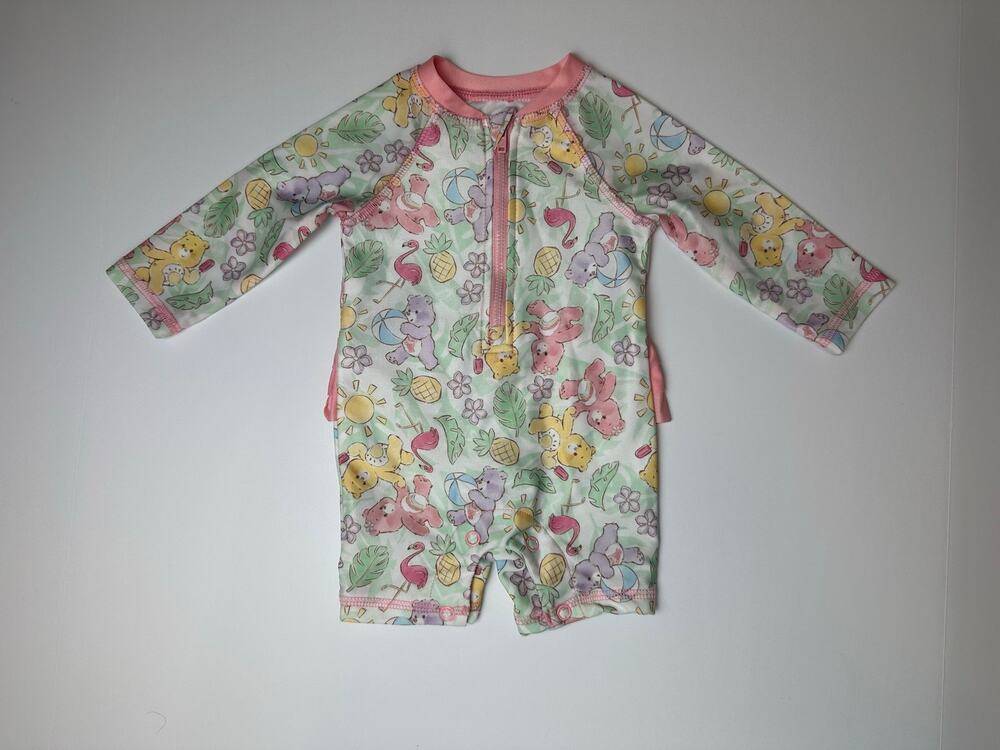 3-6 M Care Bears Modern Ruffle
Rash Guard Romper